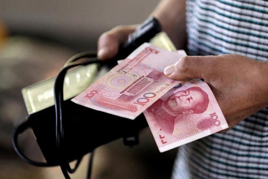 China halts yuan appreciation, interest rate outlook moves other currencies in February