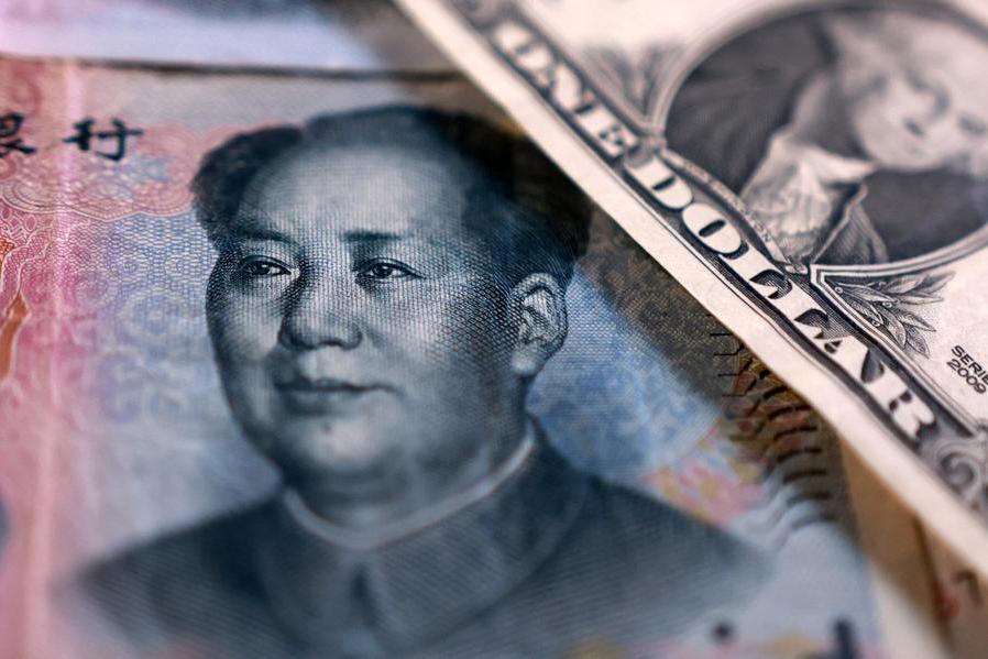 China encourages dollar buying to curb yuan appreciation